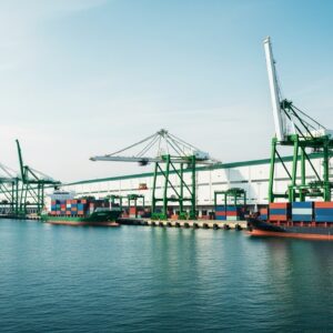 Container ships loading and unloading at port representing international trade and financing growth