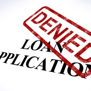 Denied small business loan application stamp showing rejection