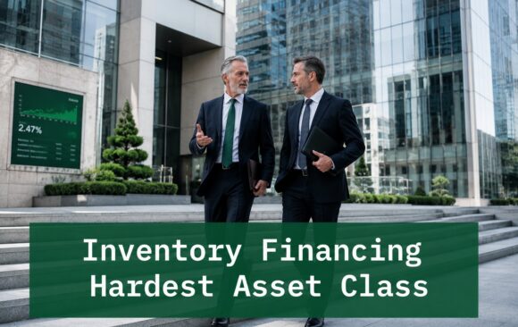 enior finance professionals discussing inventory financing strategy outside a modern corporate office building with financial district architecture and analytical business context